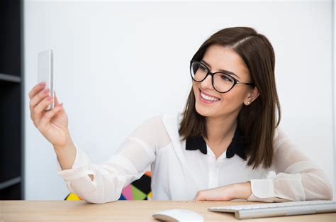 Happy Businesswoman Making Selfie Photo In Office Royalty Free Stock