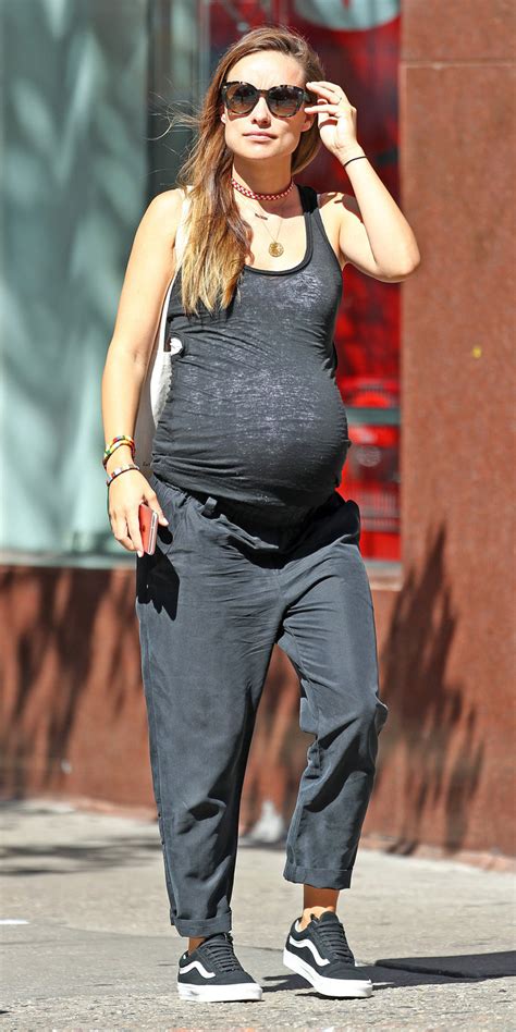 olivia wilde shows off her growing bump in fitted workout gear
