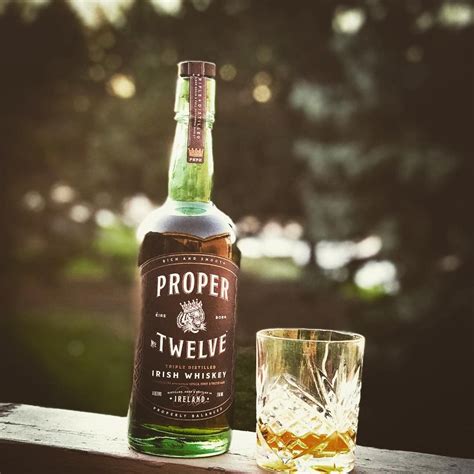 proper  whiskey whiskey drinks whiskey bottle whiskey stones kid drinks green glass