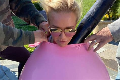 Watch Luke Bryan S Wife Stuffs Herself Into Giant Pink Ballooon