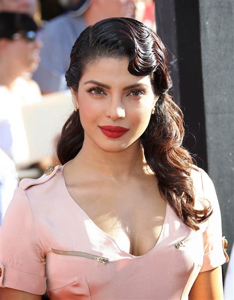 high quality bollywood celebrity pictures priyanka chopra super hot cleavage show at disney s