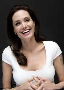 angelina jolie dons two white outfits in one day as she promotes unbroken daily mail online