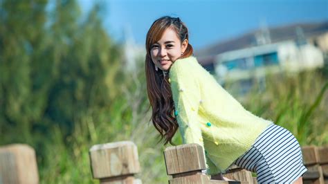 Asian Bent Over Smiling Long Haired Brunette Teen Girl Wallpaper 5136