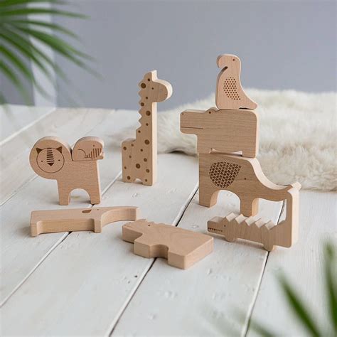 nieuw deze leuke houten diertjes kun je  elkaar zetten als een