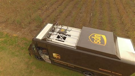 ups delivery drone takes   atop package car