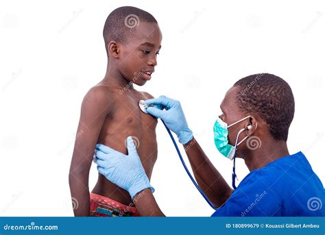 young doctor examining  boy  stethoscope stock image image  consultation nurse