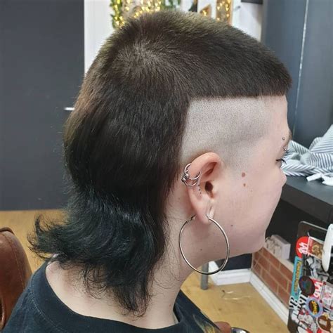 woman  mullet haircut  shaved sides alternative hair long