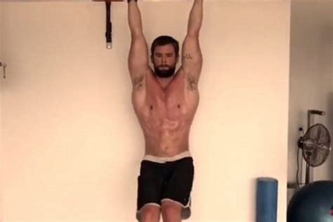 omg gossip here s chris hemsworth shirtless grunting and doing an intense workout omg