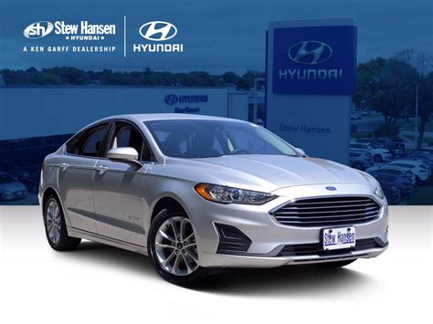 pre owned  ford fusion hybrid se fwd dr car