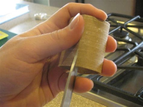 the harried homemaker preps how to make seed starting pots from toilet paper rolls