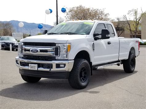 pre owned  ford super duty   srw extended cab pickup