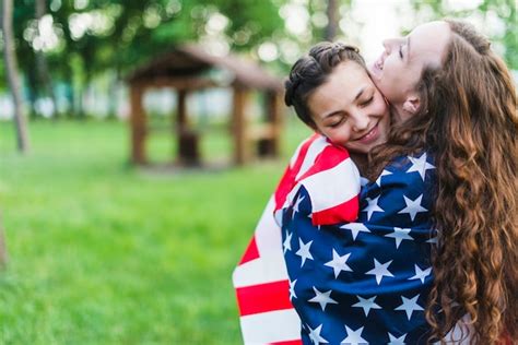 photo girls  nature hugging  american flag