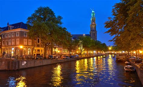 houses netherlands canal street lights amsterdam cities