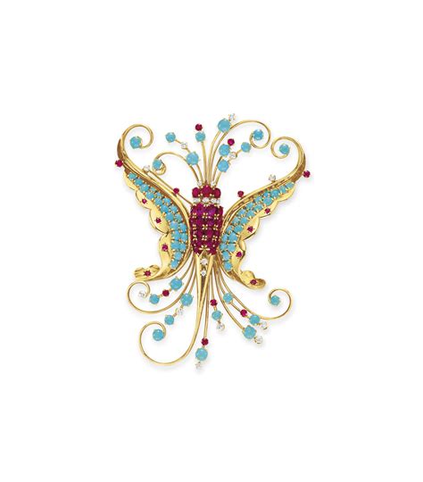 a retro diamond ruby and turquoise butterfly brooch by van cleef