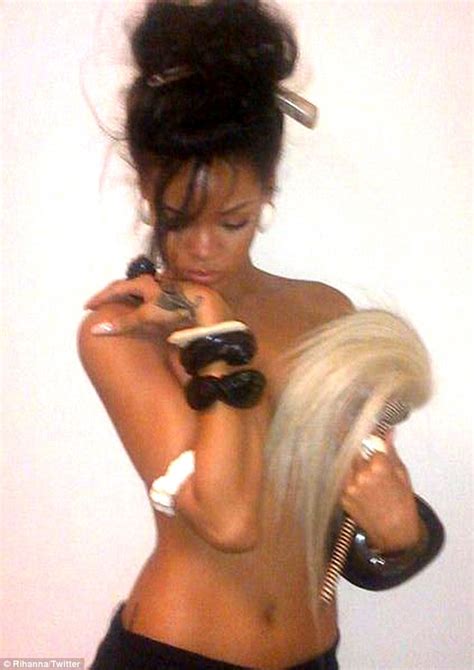 rihanna tweets cheeky topless snap showing off her natural hair colour daily mail online