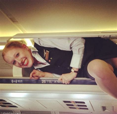 the cabin crew craze to clamber into overhead bins for instagram pictures daily mail online