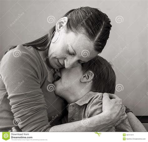 mother hugs crying son stock image image 35117411