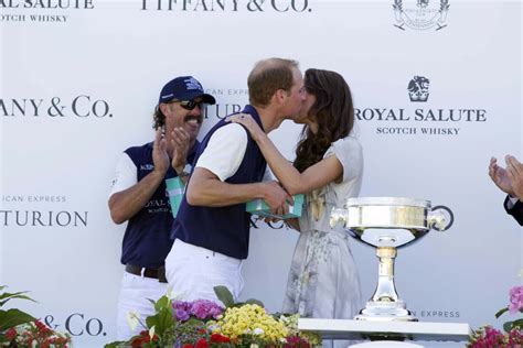 william gets a kiss after kate presents him a player prize