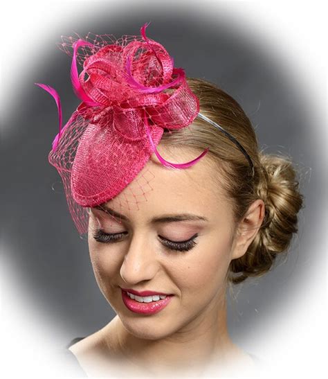small hot pink fascinator headpiece  veil  feathers