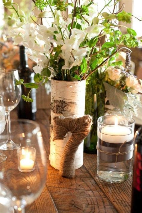 jute wrapped table number  leigh  flower centerpieces wedding