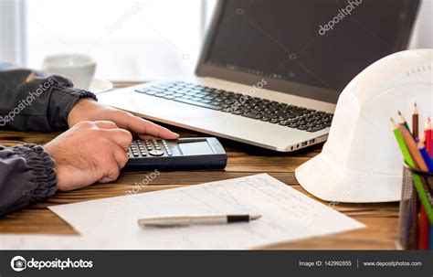 civil engineer making structural analysis calculations stock photo  ilkercelik