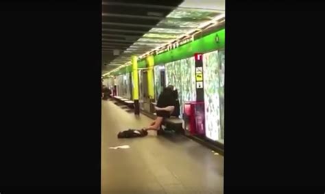 drunk couple has sex on a busy train platform in barcelona