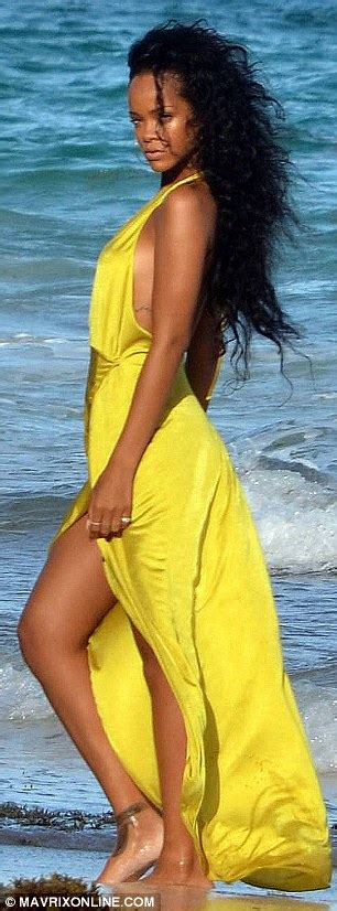 Rihanna Smoulders On The Beach As She Becomes The Official Face Of