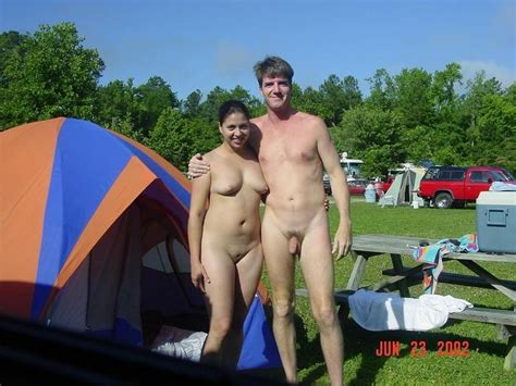 Showing Off His Naked Wife While Camping Nudeshots