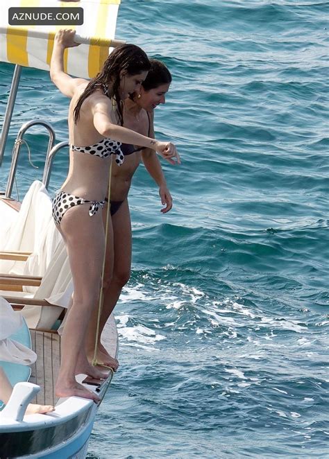 phoebe tonkin enjoys a dip in the sea with friends while