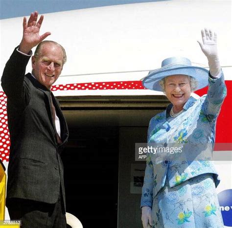 britain s queen elizabeth ii and the duke of edinburgh wave goodbye