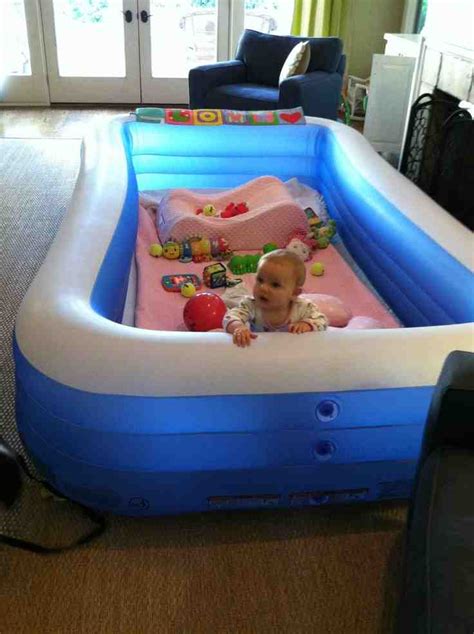 inflatable pool   playpen   toddler
