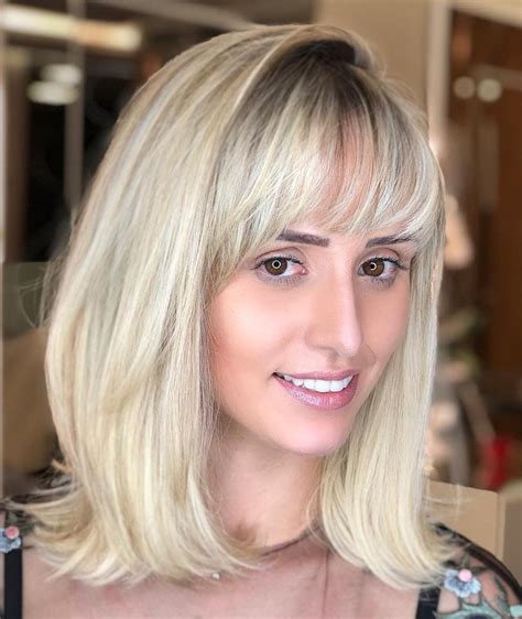 25 Latest Medium Length Hairstyles With Bangs For 2020