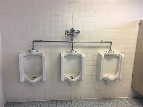 urinals     flush handle rmildlyinteresting