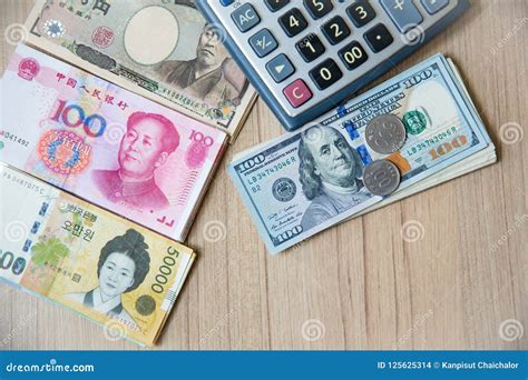 banknote currency yen japaneuro euyuan china won korea  calculator  coins image