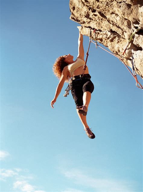 girl hanging  cliff ejc