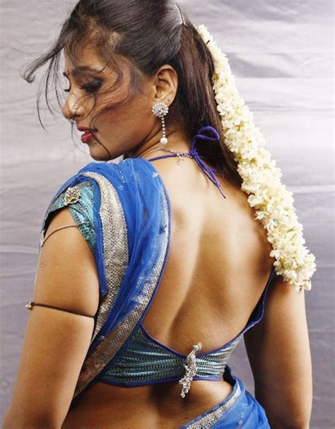 spicy photos spicy girls spicy events anushka in blue saree exposing her back