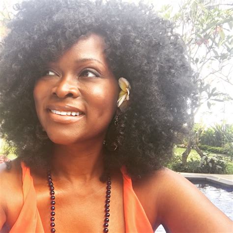 abiola abrams wears many hats and she s always naturally glam curlynikki natural hair care