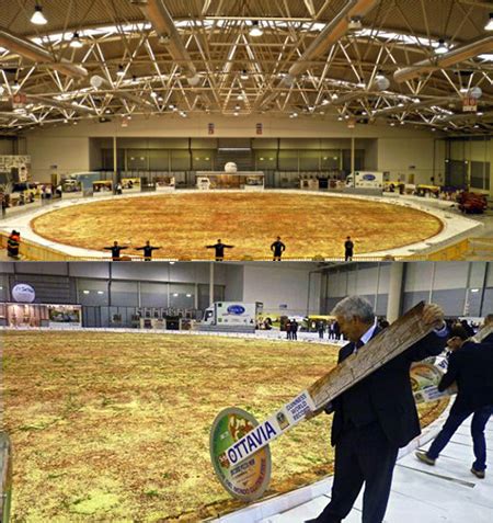 worlds largest pizza unveiled weighs   tons    pounds  cheese techeblog