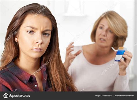 mother talking to teenage daughter about dangers of