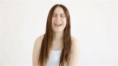 joyful girl laughing white wall stock footage sbv 323650737 storyblocks
