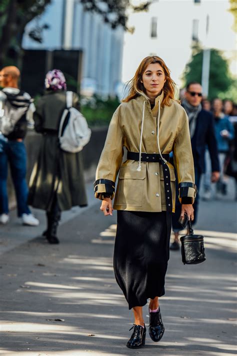 the french girl s guide to winter chic begins with the right coat vogue