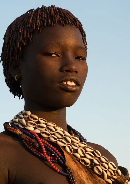 portrait of a hamer tribe teenage girl omo valley turmi ethiopia a