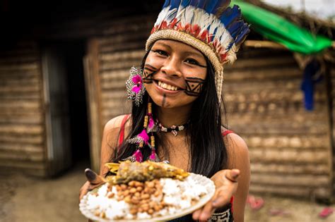 Indigenous Girl From Tupi Guarani Tribe In Manaus Showing Her Lunch