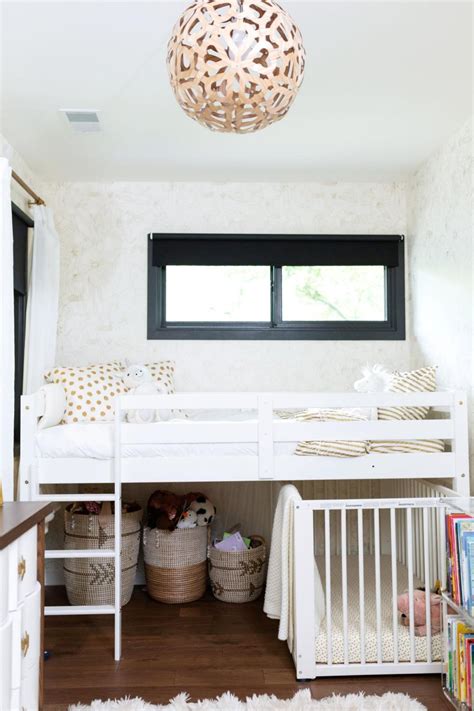 shared girls bedroom uses lofted bed to create space hgtv