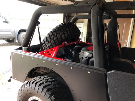 jeep tj tire carrier   wrangler tj classic gatekeeper   lift mounts excessive