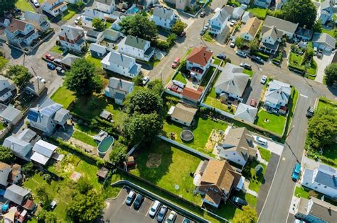premium photo aerial view   residential area  beautiful suburb  home dwelling
