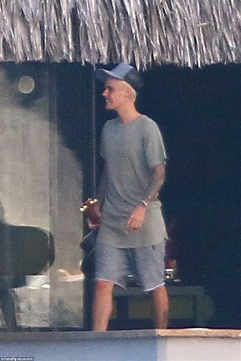 justin bieber goes full frontal naked as he enjoys a skinny dipping session in bora bora with