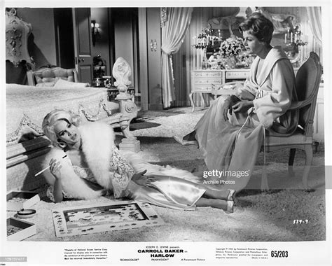 Carroll Baker On The Floor Talking To Angela Lansbury In A Scene From