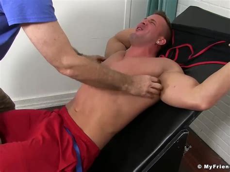 hot muscle guy gets armpits and feet tickled hard by man