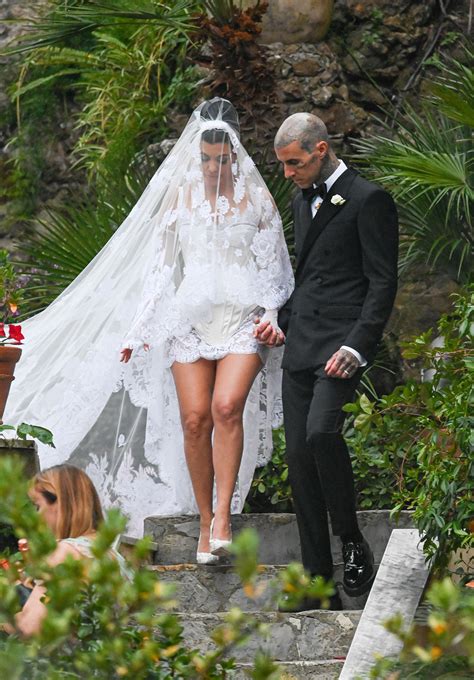 kourtney kardashian wears dolce gabbana wedding dress long veil